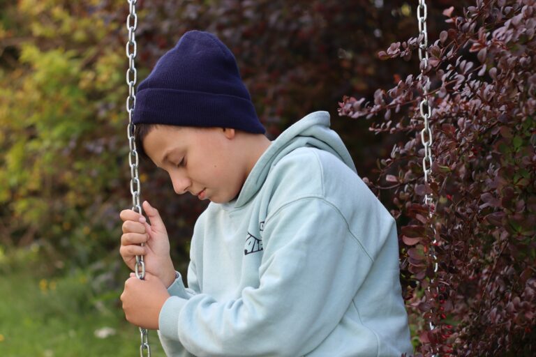 Stressed boy, depression in a child. Sad boy,unhappy.